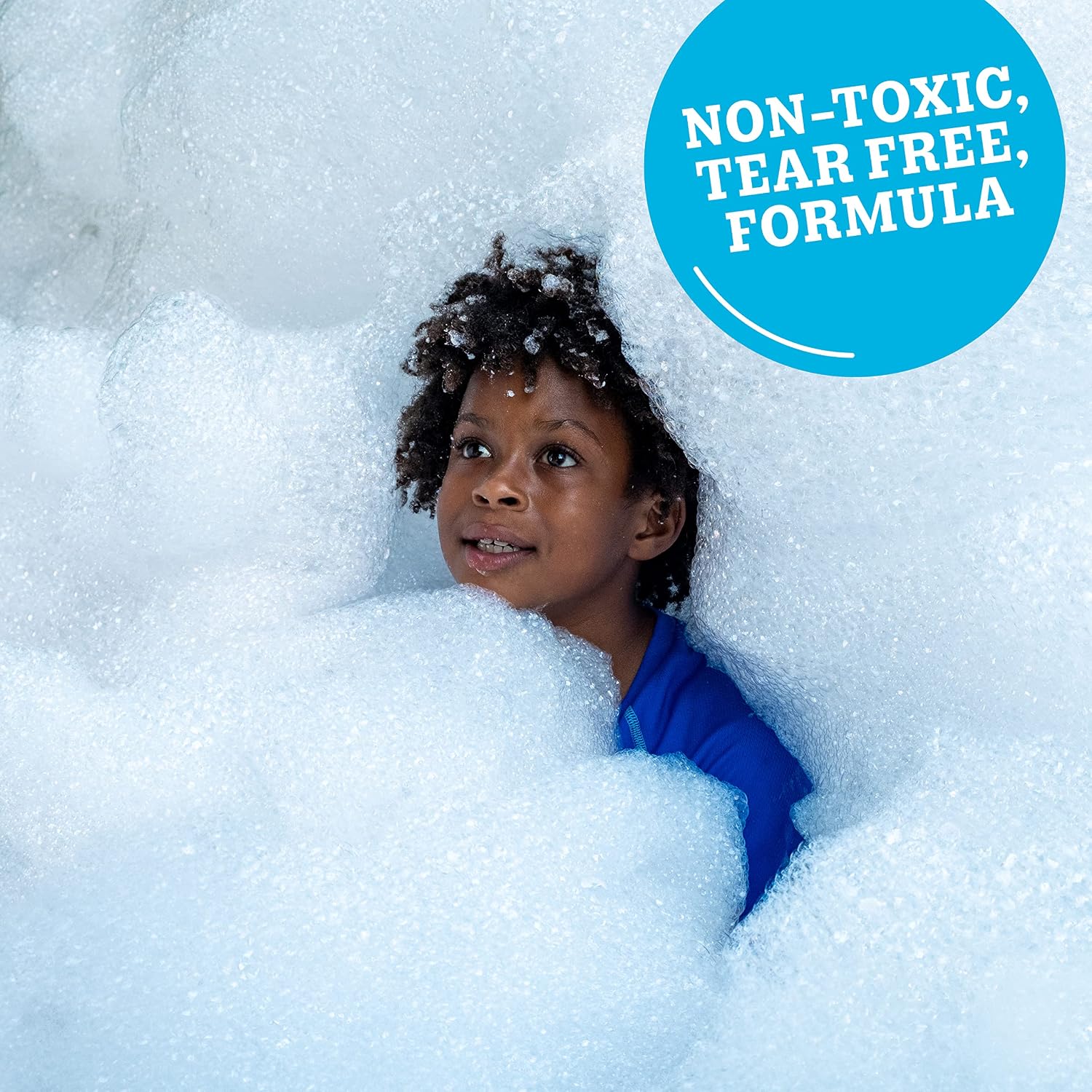 Child surrounded by non-toxic, tear-free foam